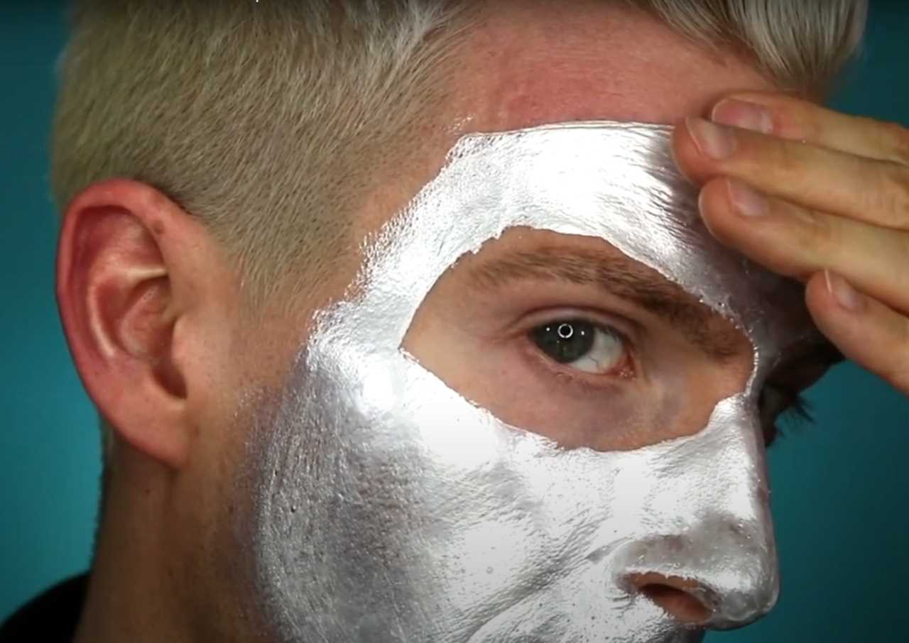 Illustration of Trevor Richie applying Glamglow Gravity Mud face mask